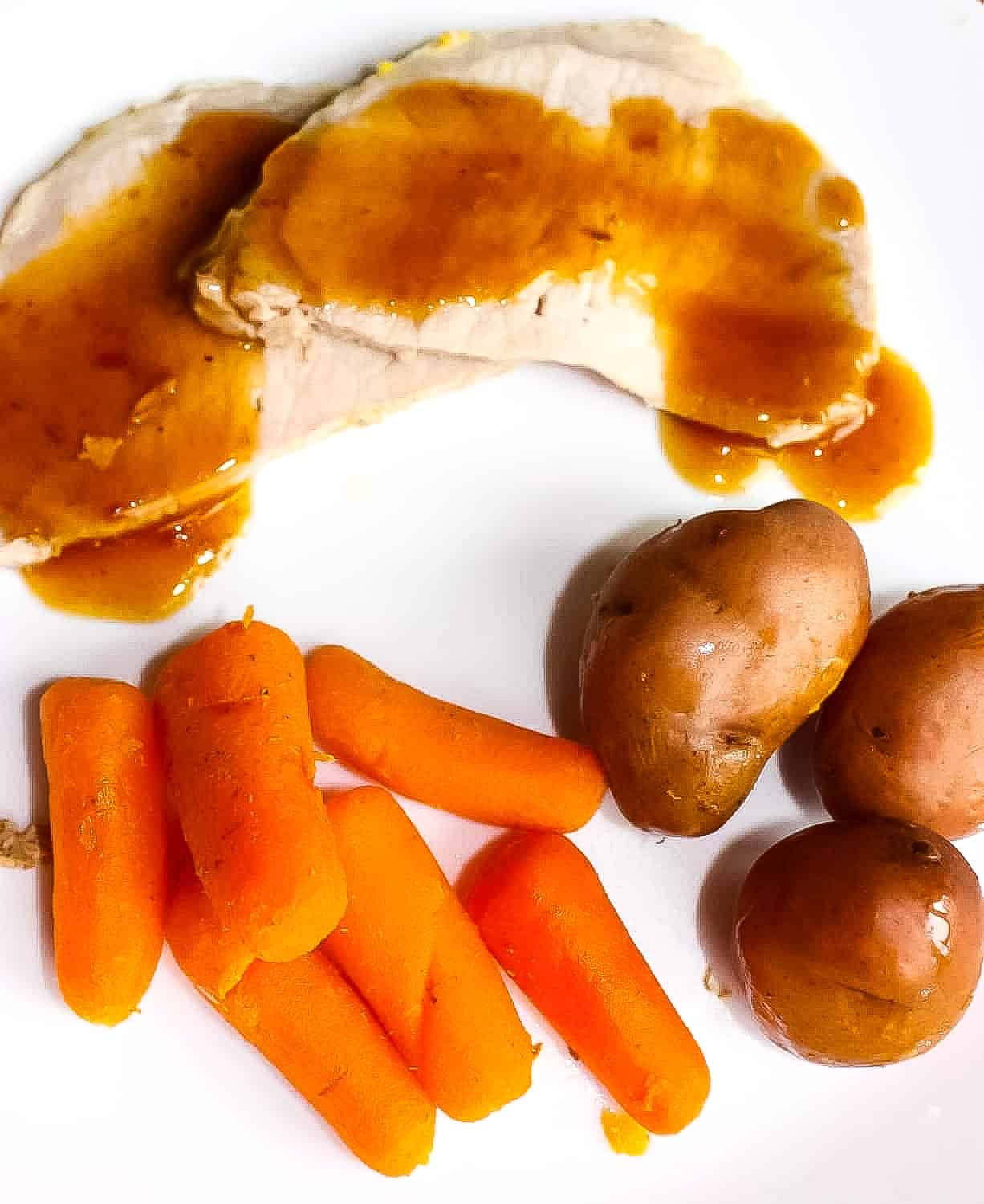 Instant Pot Pork Roast with Baby Carrots & Potatoes is an easy dinner recipe cooked all in one pot. This easy Instant Pot recipe is perfect for beginners.