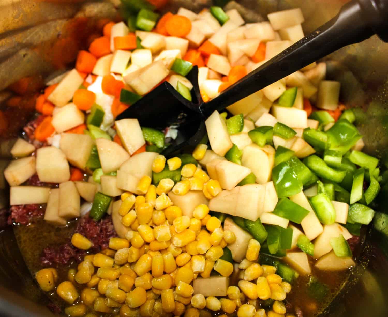 Adding the vegetables.