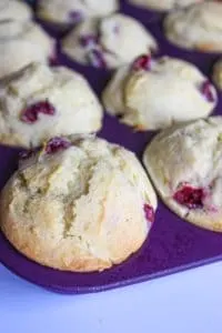 Lemon and cranberry are a winning combination and these muffins do not disappoint! Eat them warm right out of the oven or save them for later. These lemon cranberry muffins are a great snack any time.