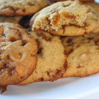 Caramel Apple Cookies are a soft, flavourful cookie  made with seasonal apple sauce and loaded with Skor Bits and Butterscotch Chipits.