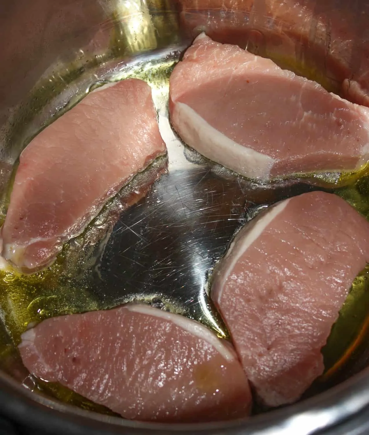 Adding the pork chops.