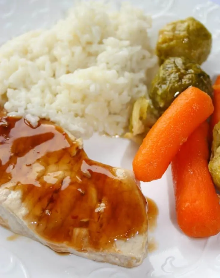 Instant Pot Pork Chops with Rice and Vegetables is a perfect example of why I love my Instant Pot. &nbsp;After working all day I can come home and cook a whole dinner for my family in one Pot!