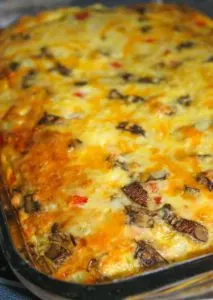This Breakfast Casserole is a great alternative to the standard bacon and egg brunch or breakfast.  The egg layer is loaded with vegetables and meat before it is poured over a gluten free crust.