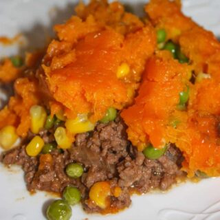 Shepherd's Pie with Sweet Potato is a twist on the classic recipe.  This hearty one dish dinner is full of flavour and is an easy recipe that will satisfy any appetite.
