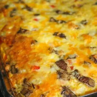 This Breakfast Casserole is a great alternative to the standard bacon and egg brunch or breakfast.  The egg layer is loaded with vegetables and meat before it is poured over a gluten free crust.