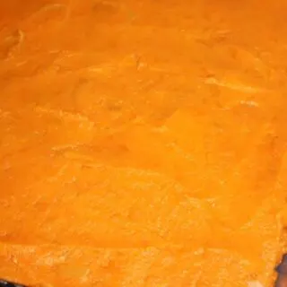 Topping with the sweet potato.