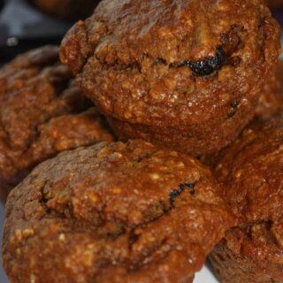 These Sweet Potato Muffins loaded with raisins and spices are a moist and delicious breakfast or snack choice.  They are so moist and tasty that you won't believe they are gluten free!