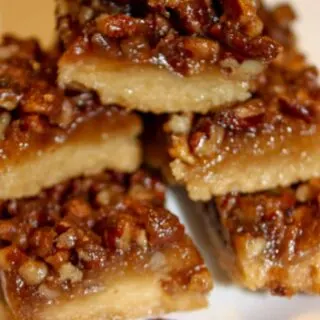 Pecan Pie Squares are a chewy, flavourful dessert square that will be a perfect addition to your holiday dessert tray.  This gluten free version will surprise your guests that are able to consume a regular diet.