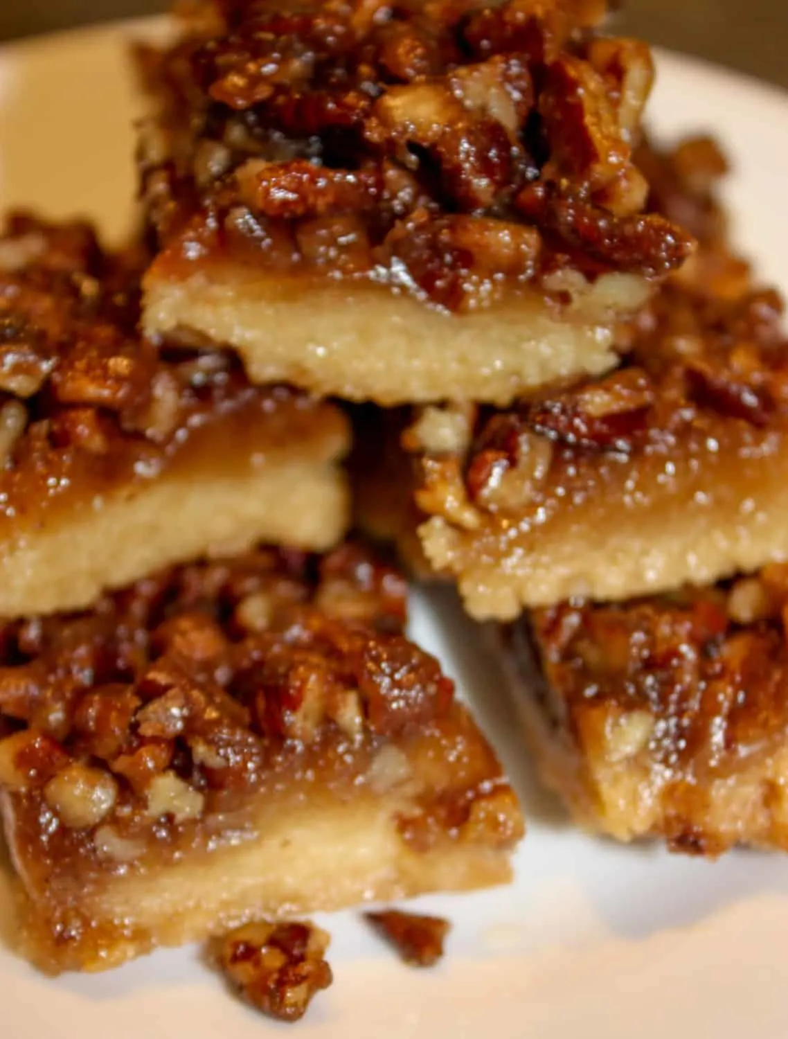 Pecan Pie Squares are a chewy, flavourful dessert square that will be a perfect addition to your holiday dessert tray.  This gluten free version will surprise your guests that are able to consume a regular diet.