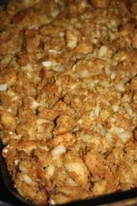 Festive Green Bean Casserole is a gluten free holiday variation that is loaded with stuffing and cranberries.