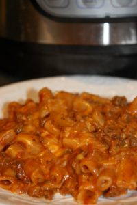 Hamburger Macaroni and Cheese is a quick and easy meal to prepare in the Instant Pot.  It is loaded with ground beef, pasta sauce, and cheese. The availability of gluten free noodles brings the opportuntity to dig out recipes that we have not been able to enjoy in many years!