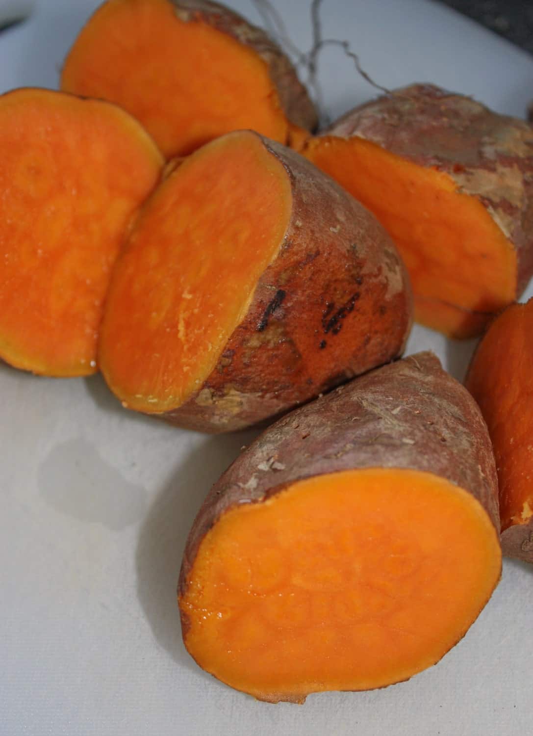 Cut sweet potatoes and scoop out flesh.