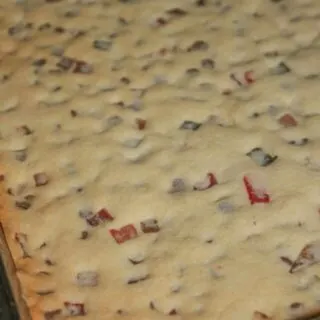 Festive Shortbread Cookie Bars are a colourful addition to any holiday dessert tray.  This gluten free version will certainly hit the spot for anyone whether they have a gluten intolerance or can eat a regular diet.