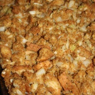 Festive Green Bean Casserole is a gluten free holiday variation that is loaded with stuffing and cranberries.