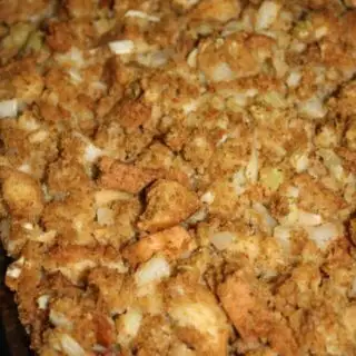 Festive Green Bean Casserole is a gluten free holiday variation that is loaded with stuffing and cranberries.