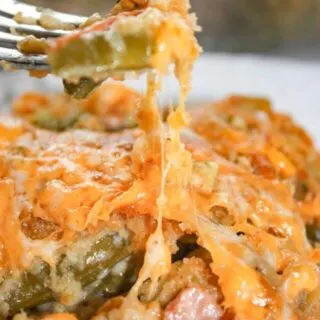 Green Bean Casseroles are a traditional side dish in many homes.  This Cheesy Garlic Green Bean Casserole is a flavourful gluten free variation that will be sure to please the palates of both family and guests.