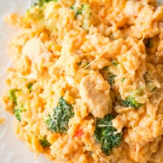 Instant Pot Cheesy Broccoli Chicken and Rice is an easy pressure cooker dinner recipe made with long grain rice and loaded with chunks of chicken breast, broccoli florets, salsa con queso, mozzarella, cheddar and Parmesan.