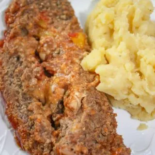 The stuffed meatloaf is moist, full of flavour and paired with a side of garlic mashed potatoes that will satisfy your taste buds. 