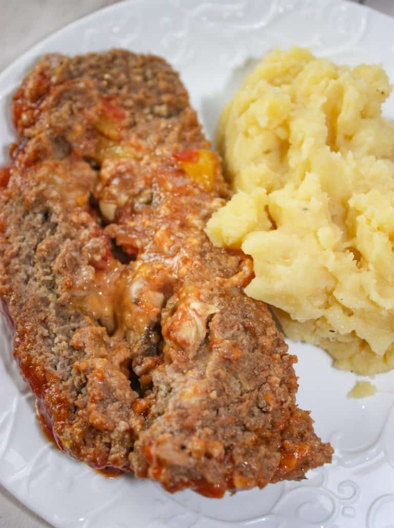 The stuffed meatloaf is moist, full of flavour and paired with a side of garlic mashed potatoes that will satisfy your taste buds. 