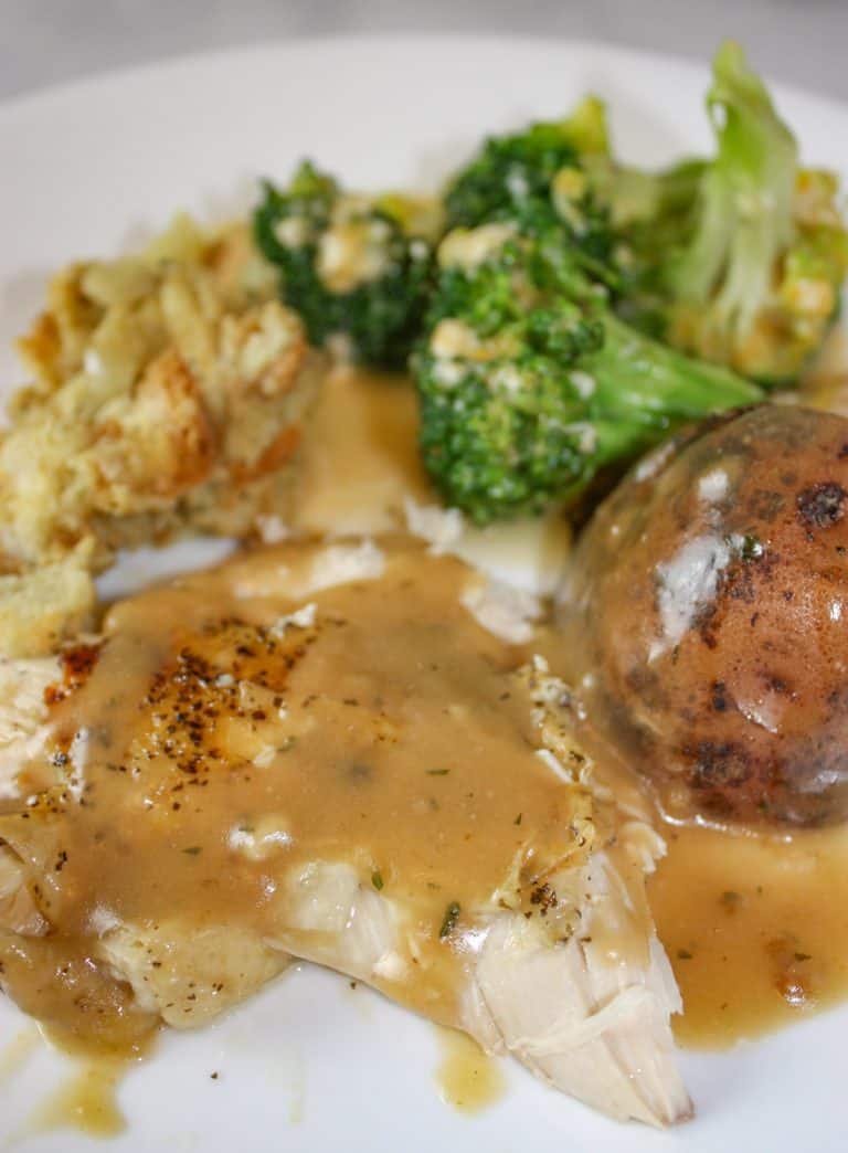 A Whole Chicken Dinner with everything made in one Pot!  A stuffed chicken with sides of potatoes and broccoli in cheese sauce ready before you know it! 