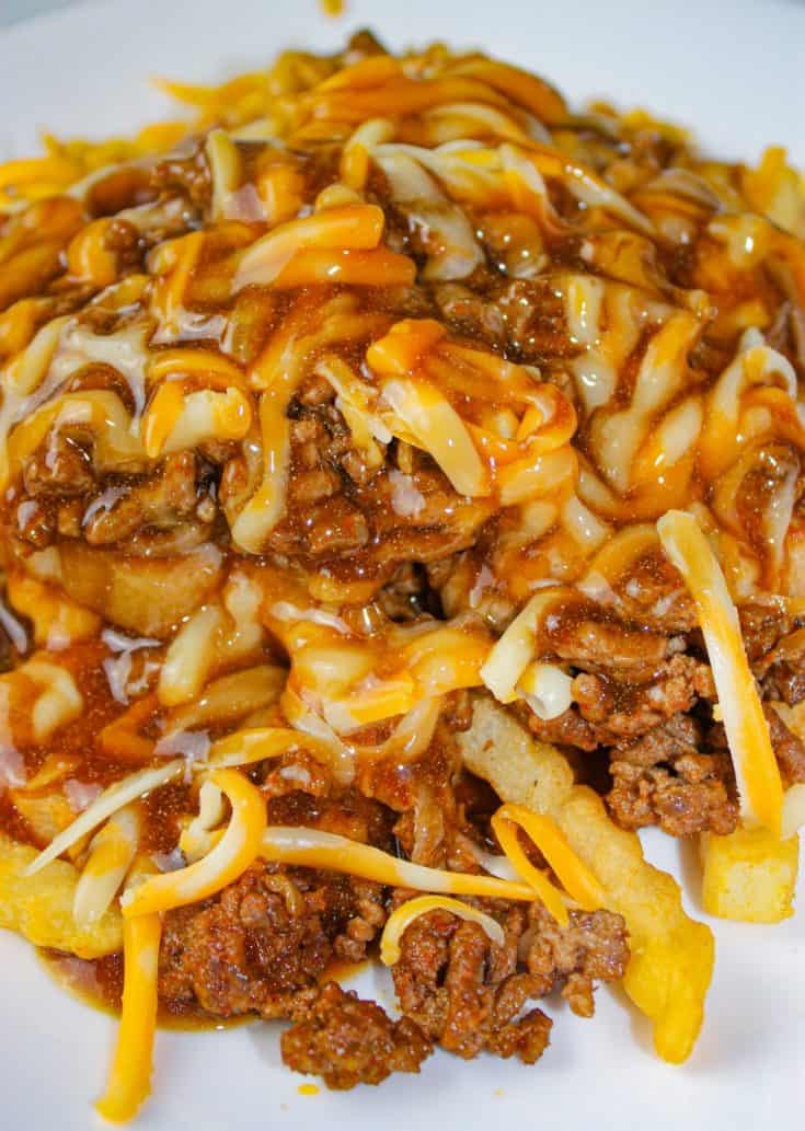 Tex Mex Poutine is a quick and easy recipe that would be great for a Super Bowl Party.  But don't just save it for a special occasion because it deserves to be served any day of the year!