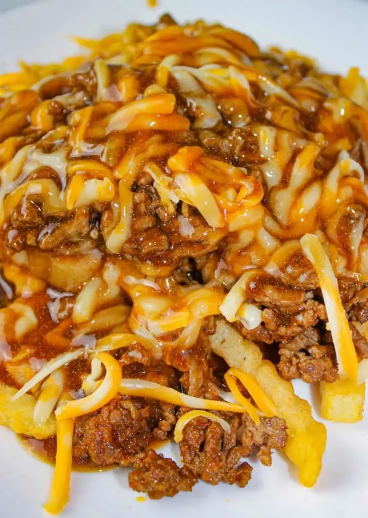 Tex Mex Poutine is a quick and easy recipe that would be great for a Super Bowl Party.  But don't just save it for a special occasion because it deserves to be served any day of the year!