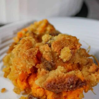 Sweet Potato is a versatile side dish.  This crumble version boosts the flavour with a crunchy topping loaded with brown sugar and pecans.  
