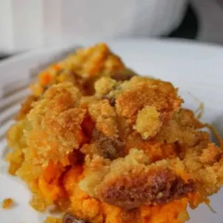 Sweet Potato is a versatile side dish.  This crumble version boosts the flavour with a crunchy topping loaded with brown sugar and pecans.  