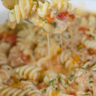 Instant Pot Cheesy Pasta and Turkey is an easy and delicious one pot pasta dish smothered in a creamy cheese sauce. 