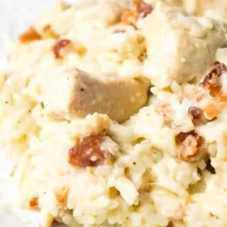 Instant Pot Bacon Parmesan Chicken and Rice is an easy pressure cooker chicken dinner recipe made with boneless, skinless chicken breasts and long grain rice, loaded with crumbled bacon and Parmesan cheese.
