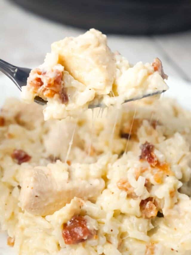 Instant Pot Bacon Parmesan Chicken and Rice is an easy pressure cooker chicken dinner recipe made with boneless, skinless chicken breasts and long grain rice, loaded with crumbled bacon and Parmesan cheese.