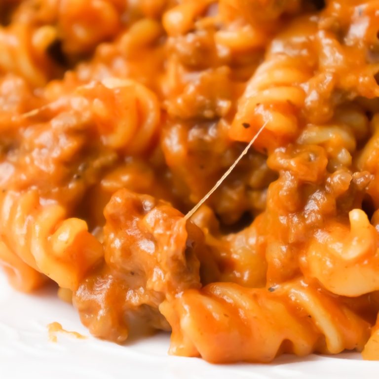 Instant Pot Cheesy Sloppy Joe Pasta is an easy gluten free pasta recipe loaded with ground beef, homemade sloppy joe sauce, mozzarella and cheddar cheese.