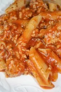 Instant Pot Pasta and Meat Sauce is a simple pressure cooker recipe that can be prepared in under 30 minutes. It is loaded with meat sauce and gluten free pasta.