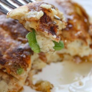 Gluten Free Western Pancakes are a savoury pancake loaded with ham, bacon, onions, green pepper and cheese.  Pour on some sweet, pure maple syrup for a delightful contrast of flavours!