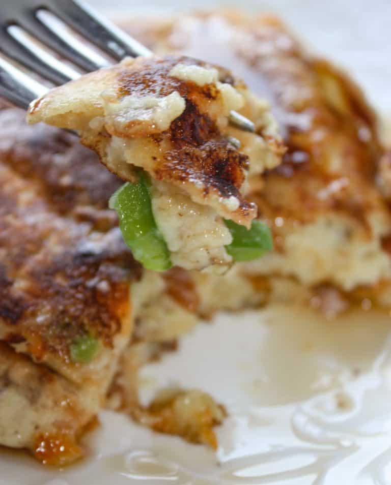 Gluten Free Western Pancakes are a savoury pancake loaded with ham, bacon, onions, green pepper and cheese.  Pour on some sweet, pure maple syrup for a delightful contrast of flavours!