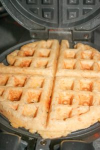 These Gluten Free Seafood Waffles are loaded with salmon, swiss cheese and can be smothered in pure maple syrup before digging in!