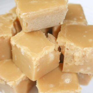 Maple Fudge is a creamy, decadent treat that will get you rave reviews.  This easy recipe does not require a candy thermometer and can be made in minutes. Then just let it harden and enjoy!