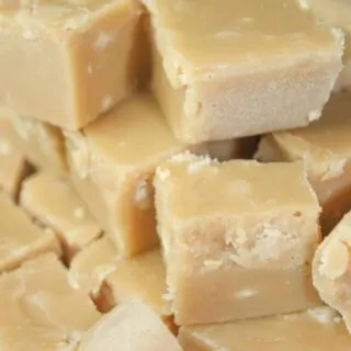 Maple Fudge is a creamy, decadent treat that will get you rave reviews.  This easy recipe does not require a candy thermometer and can be made in minutes. Then just let it harden and enjoy!