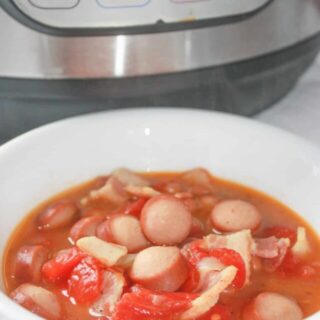 Instant Pot Pork and Bean Soup is an easy comfort meal for the whole family.  Loaded with bacon and weiners it is sure to be a hit with young and old alike!