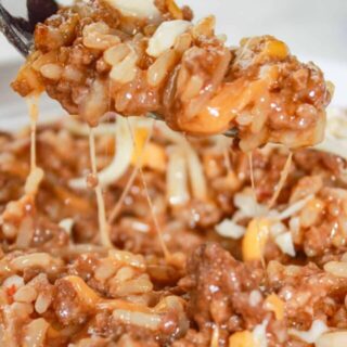 Instant Pot Cheesy BBQ Ground Beef and Rice can be on your table in short order any day of the week.  It is a enrobed in a delightful sauce that is a combination of sweet and smoky with a bit of heat.