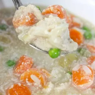 Instant Pot Chicken Vegetable Soup with Rice is a hearty soup loaded with chunks of chicken, vegetables and some long grain white rice.