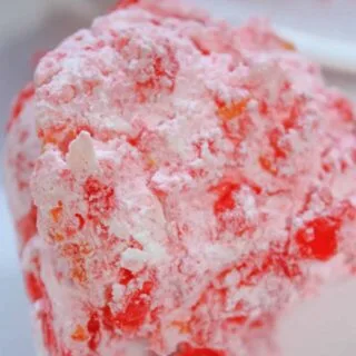 Strawberry Banana Mandarin Jello Mold is a sweet and tasty side dish that adds a burst of colour to holiday get togethers!