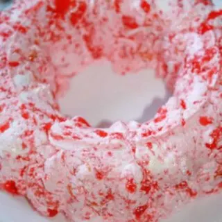 Strawberry Banana Mandarin Jello Mold is a sweet and tasty side dish that adds a burst of colour to holiday get togethers!
