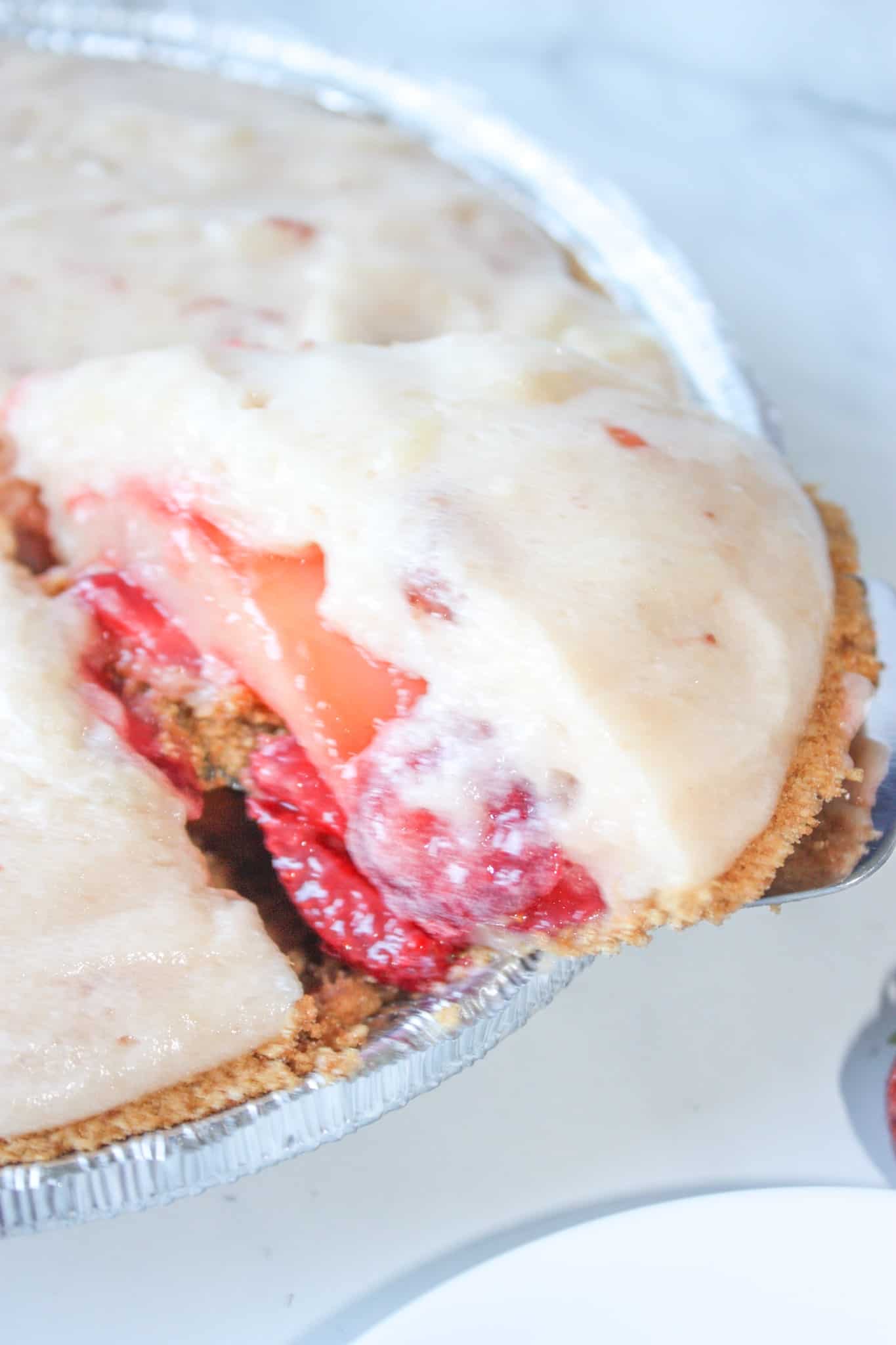 Lemon Strawberry Pie is a delectable blend of summer flavours layered on top of a gluten free graham crust.
