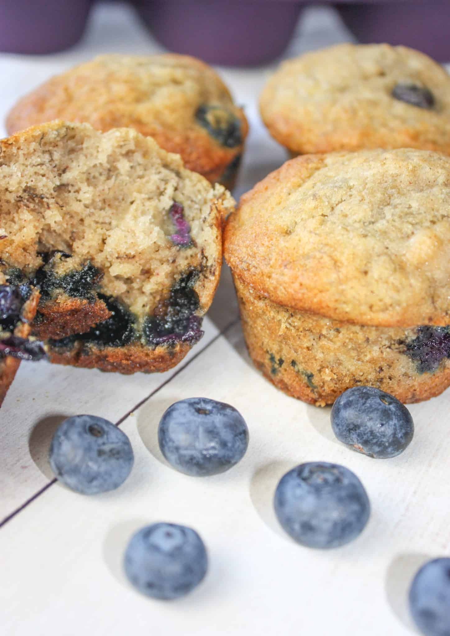 Blueberry Banana Muffins are a tasty seasonal twist on traditional banana muffins.  This moist and delicious gluten free snack is loaded with fresh blueberries.