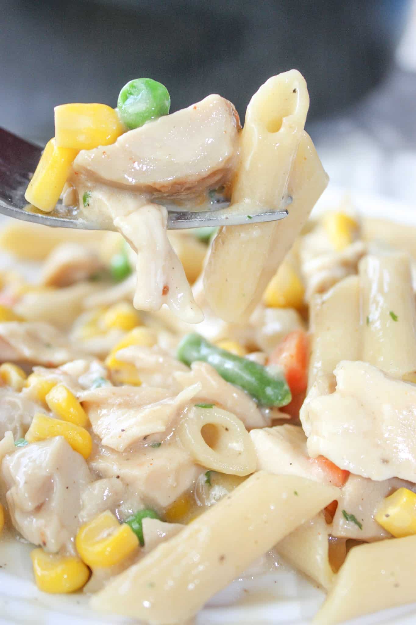 Creamy Stove Top Chicken and Pasta is a comfort recipe that is quick and easy to make.  This gluten free skillet dinner is sure to hit the spot any night of the week.