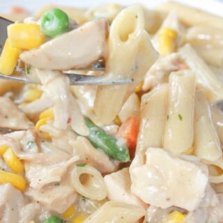 Creamy Stove Top Chicken and Pasta is a comfort recipe that is quick and easy to make.  This gluten free skillet dinner is sure to hit the spot any night of the week.