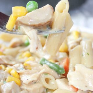 Creamy Stove Top Chicken and Pasta is a comfort recipe that is quick and easy to make.  This gluten free skillet dinner is sure to hit the spot any night of the week.