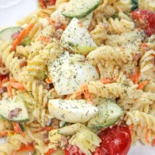 Creamy Lemon Dill Pasta Salad is a flavourful side dish for any occasion. &nbsp;Loaded with gluten free pasta, vegetables, bacon and dried dill it is a tasty,colourful addition to any meal.