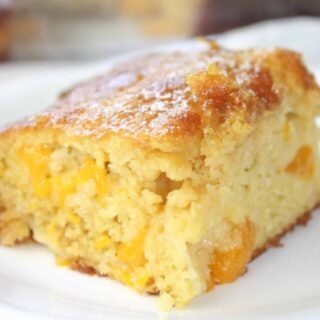 Gluten Free Mandarin Cake is a very quick and easy recipe to make. Loaded with mandarin oranges it is a nice burst of citrus any time of the year.